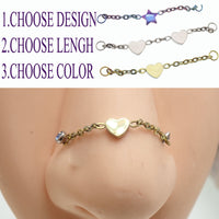 Titanium body jewelry chain with a heart design by Body Clickers, suitable for various piercings, 30mm length.