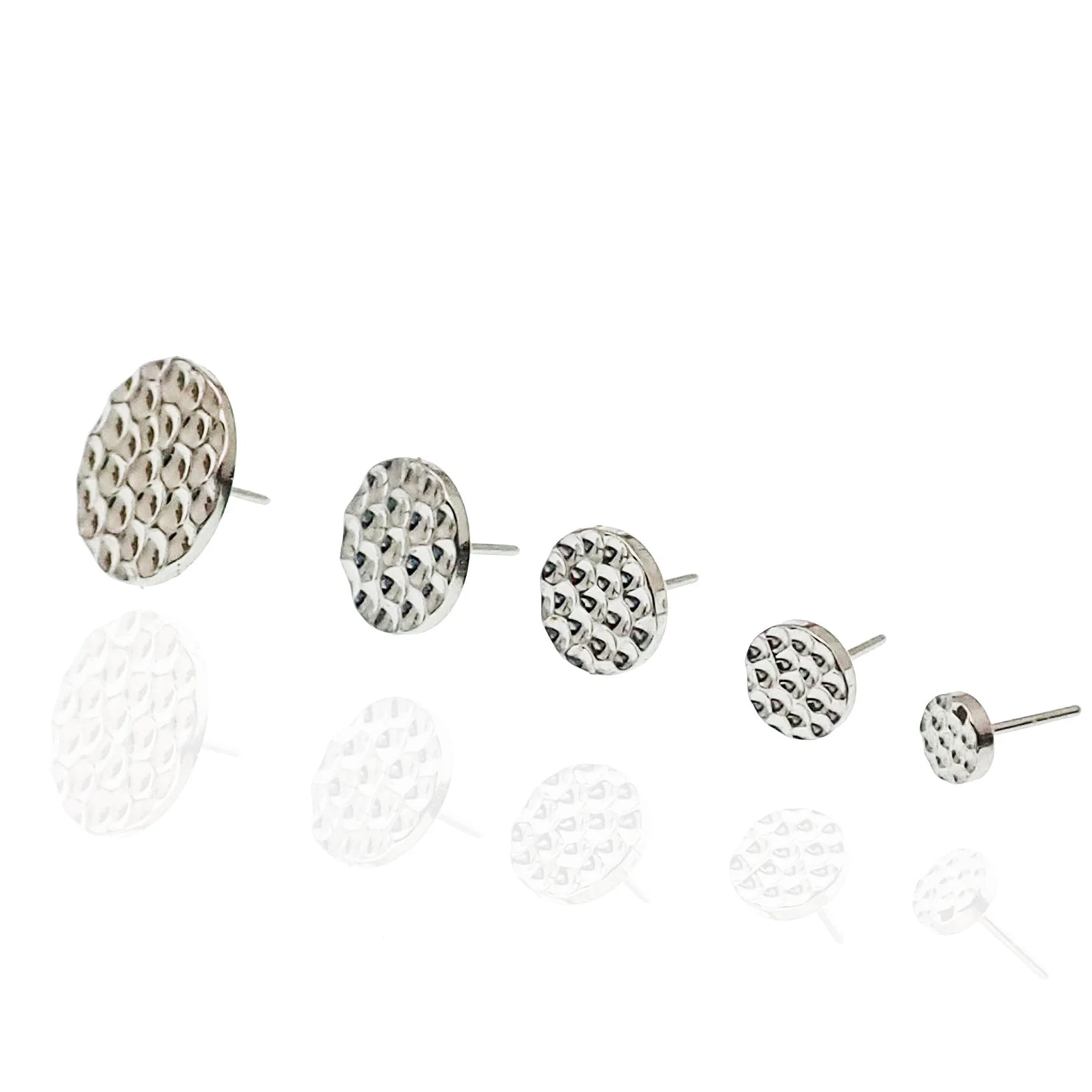 Titanium hammered threadless disc implant jewelry by Body Clickers, 3mm top for body piercing with a sleek, textured finish.