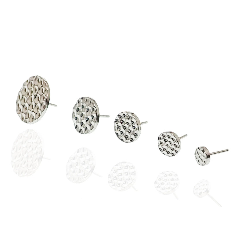 Titanium hammered threadless disc implant jewelry by Body Clickers, 3mm top for body piercing with a sleek, textured finish.