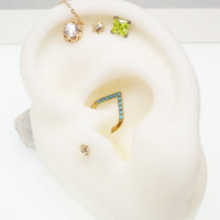 16g turquoise titanium clicker with 8mm diameter, daith piercing jewelry from Body Clickers Body Jewelry.