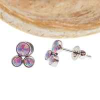 Pair of Body Clickers Titanium Trinity Fire Opal earrings with white opal accents, 20g implant grade jewelry for piercings.