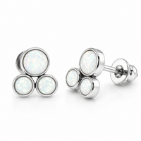 Pair of Body Clickers Implant Titanium Trinity Fire Opal Earrings with white opal and 20g gauge for pierced ears.