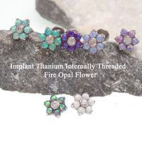 Flower Fire Opals flatback piercing by Body Clickers in 18G with 6mm flower design and vibrant fire opal stones.