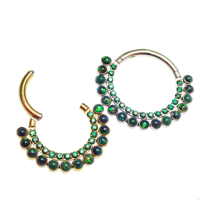 Titanium clicker with galaxy fire opal and emerald CZ stones, 16g body jewelry for piercing by Body Clickers.