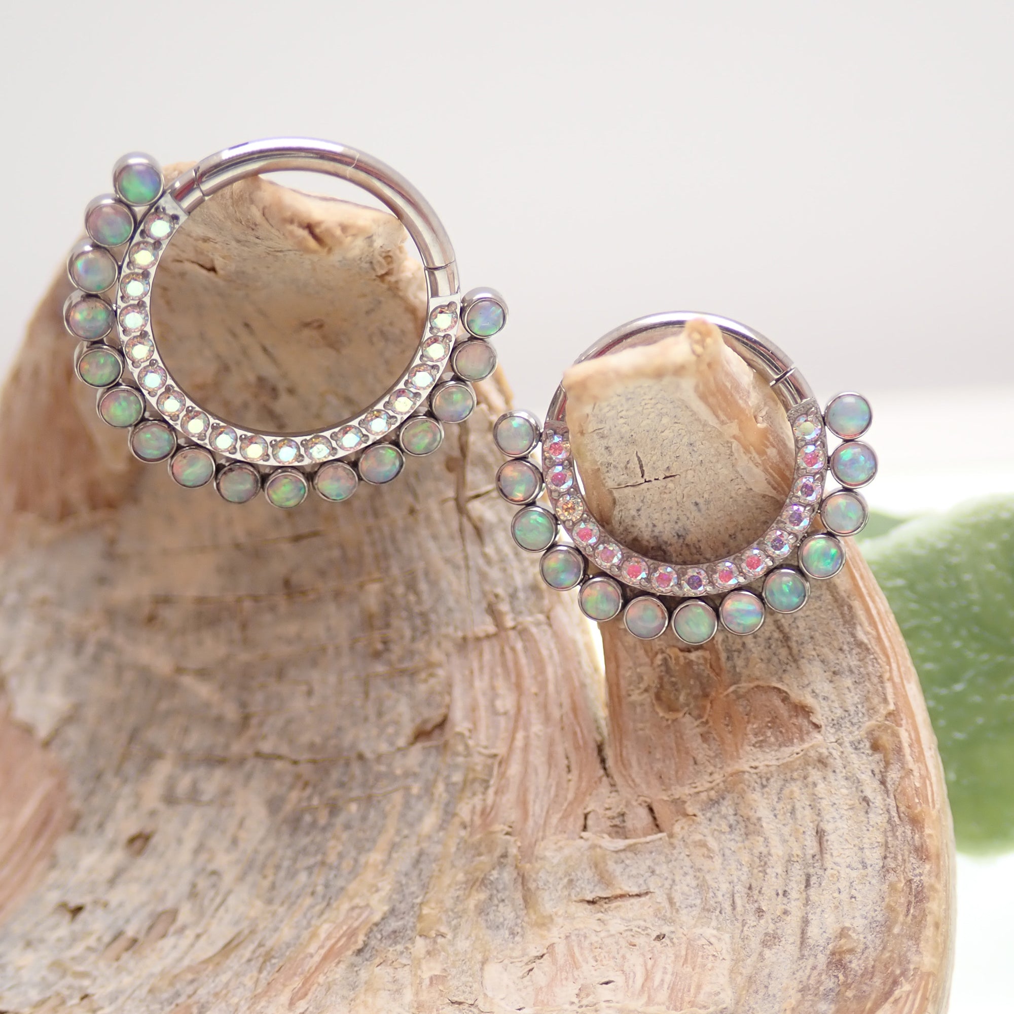 Opalite peach and clear CZ titanium clicker body jewelry, 16g, with an 8mm diameter for body piercing.