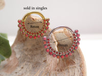 Red fire opal and CZ titanium clicker earring in 16g body jewelry with 8mm stones from Body Clickers.