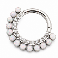 White opal and clear CZ titanium clicker earring in 16g body jewelry with an 8mm diameter.