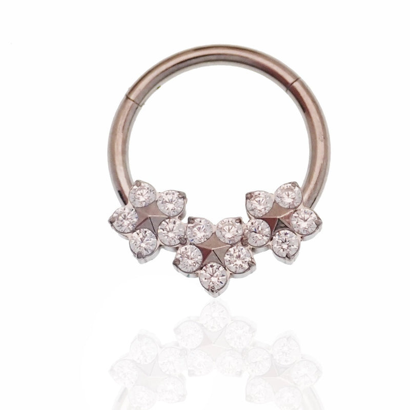 Flower titanium hinged 10mm clicker earring from Body Clickers, 16g, with a detailed floral design and smooth hinge closure.