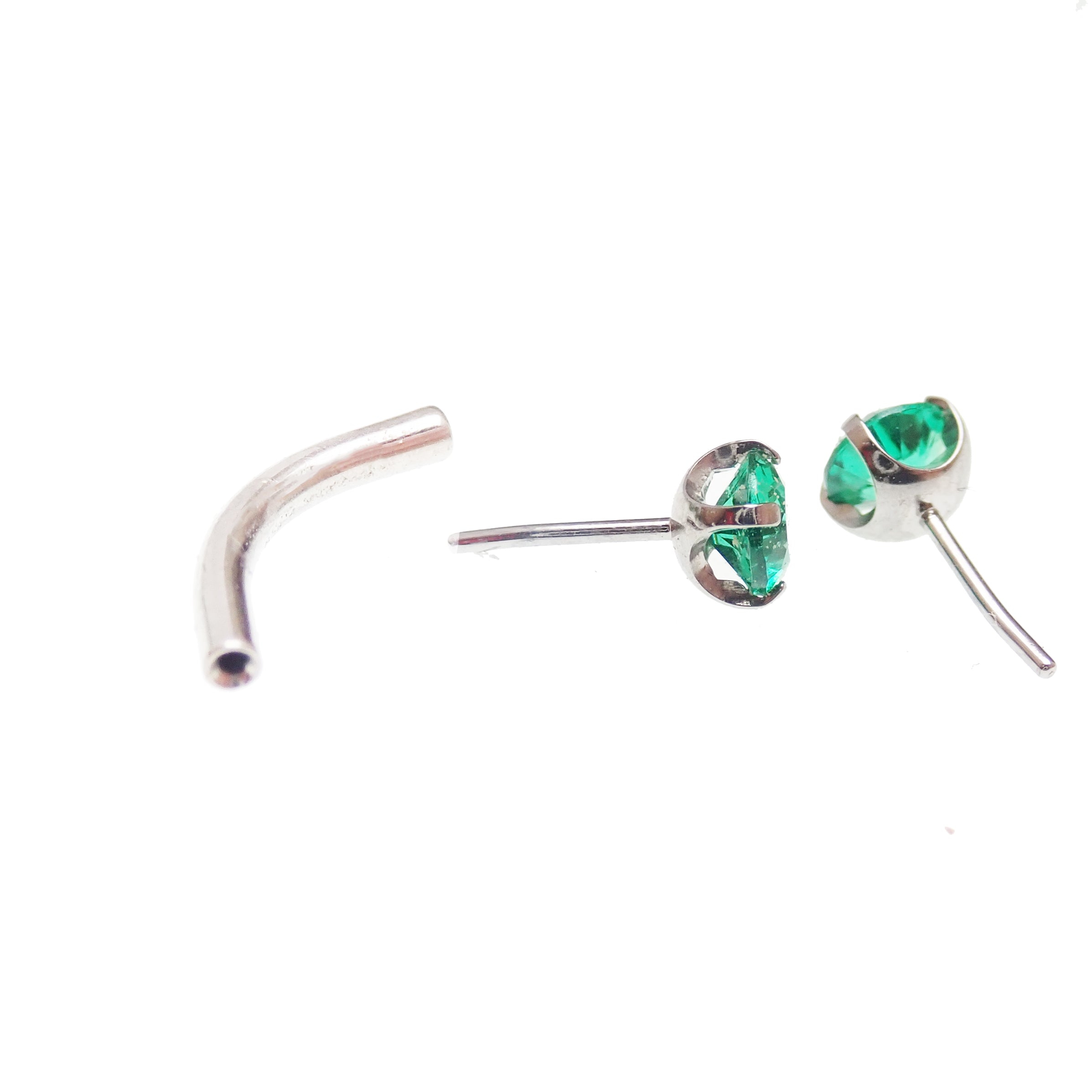 Titanium curve barbell with emerald stones, 18g, 16g, 14g, and 3mm stones from Body Clickers, featuring push fit design.