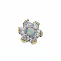 Titanium dermal top with cubic zirconia flower and opal center, 14g Body Clickers dermal piercing jewelry.
