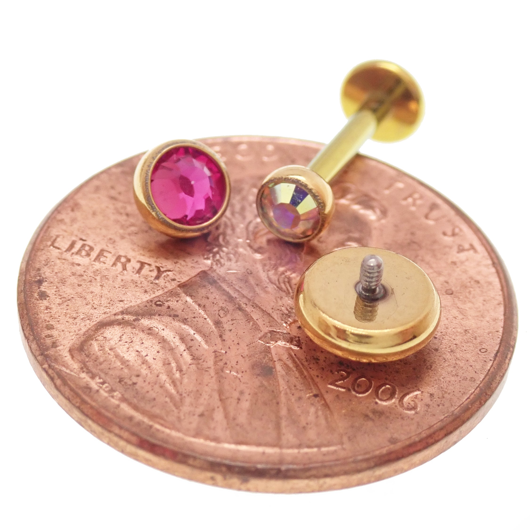 Body Clickers PVD gold clear CZ, cerise, AB rainbow internally threaded implant titanium earrings in 14g, 16g, 18g sizes.