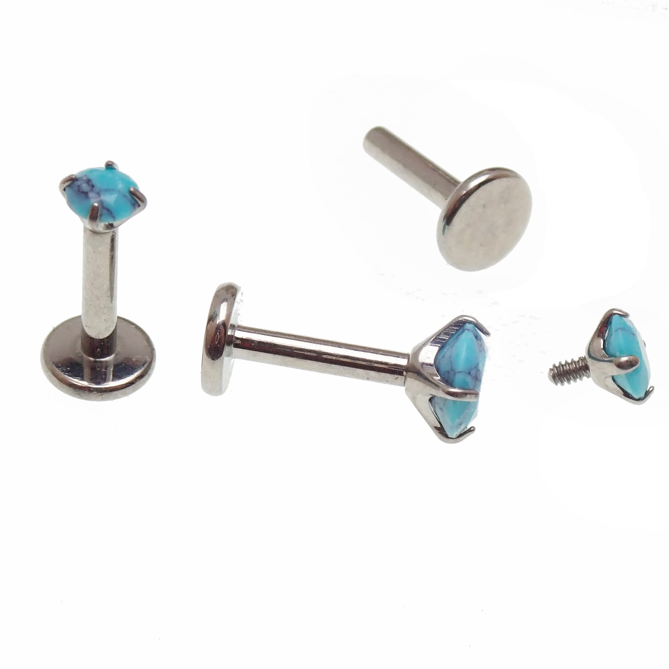 Turquoise claw set stone internally threaded titanium labret piercing in 14g, 16g, and 18g earring sizes with flatback design.