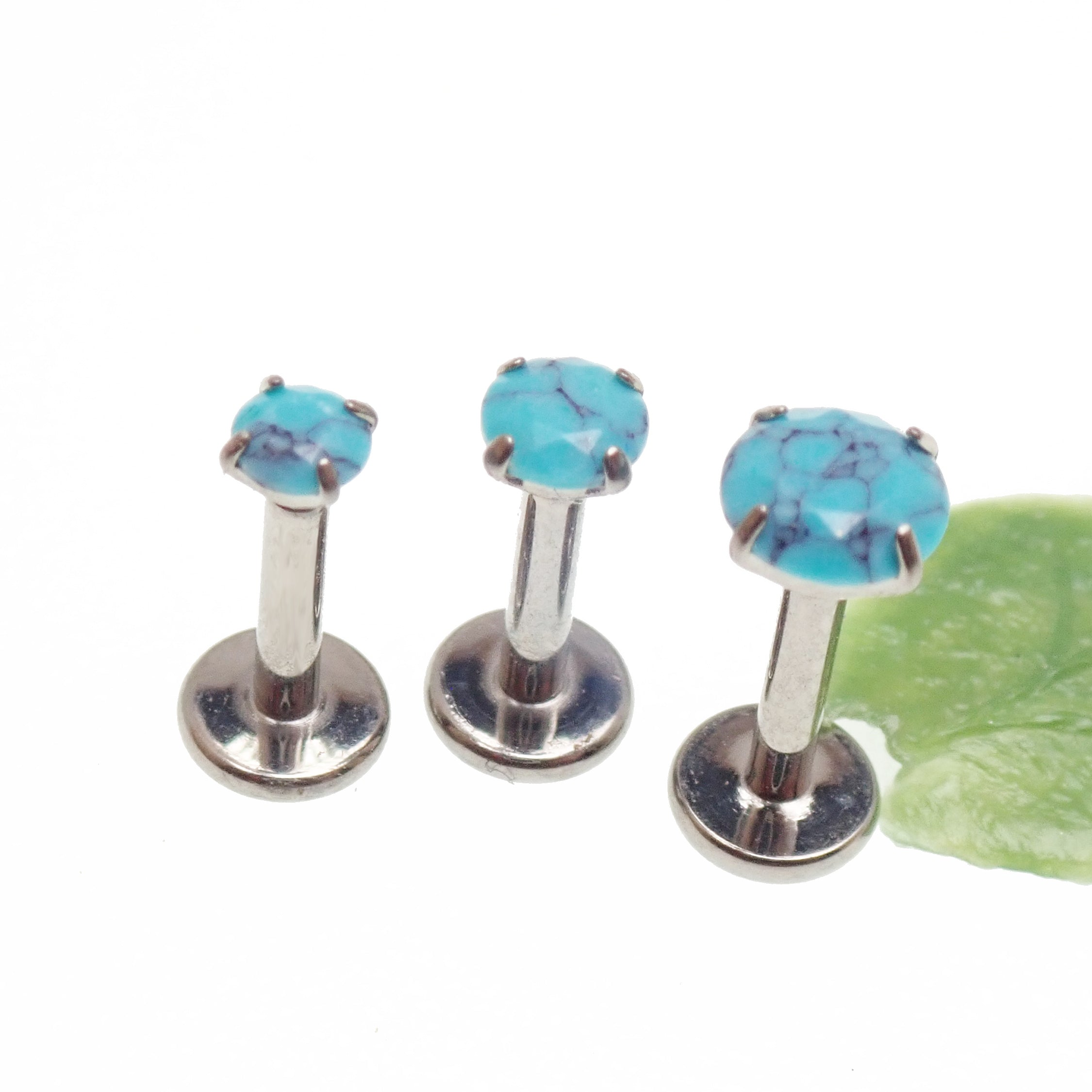 Turquoise claw set stone internally threaded titanium labret piercing earrings in 14g, 16g, 18g with flatback design.