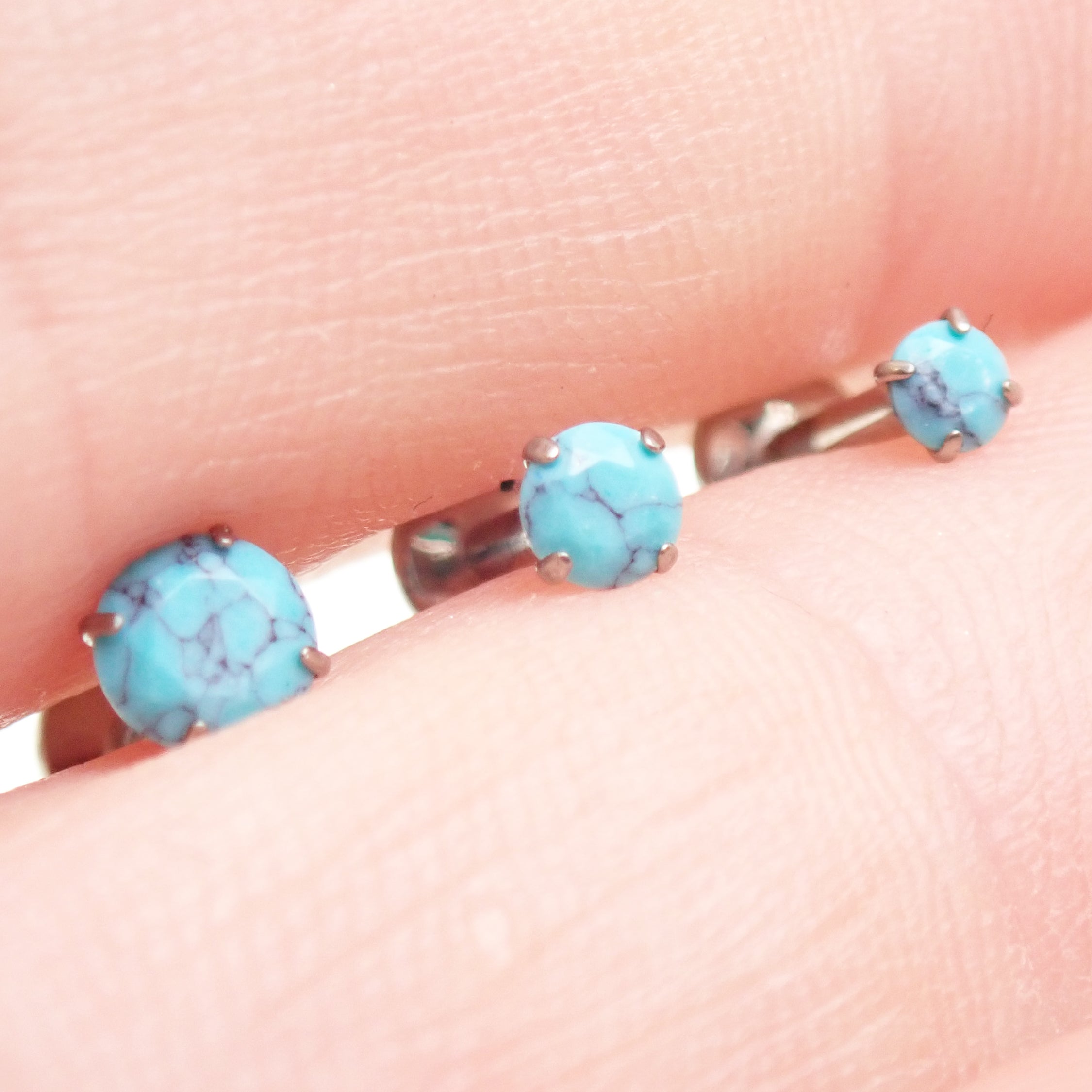 Turquoise Claw Set titanium labret piercing earrings with internally threaded flatback in 14g, 16g, and 18g sizes.