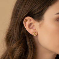 Alien internally threaded titanium flatback labret earrings in 14g, 16g, and 18g with a sleek, modern design.