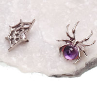 Internally threaded titanium Amethyst Spider & Web flatback earrings for piercings, 0.9mm thread, featuring purple gemstone design.
