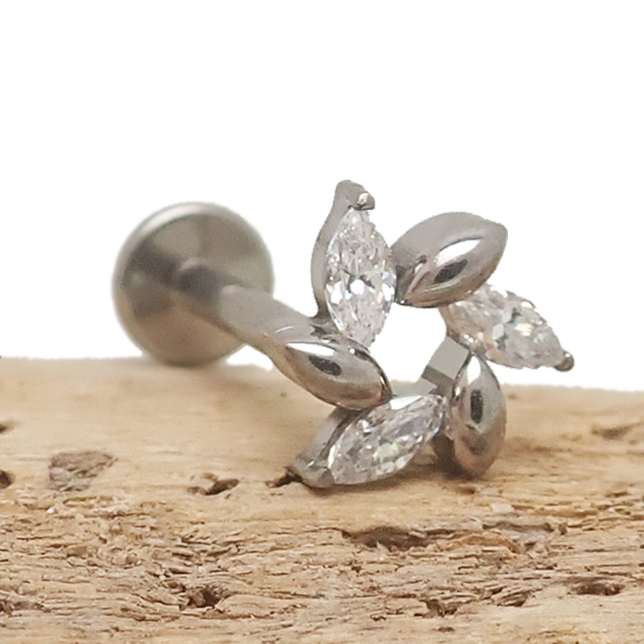 Clear CZ flower petal spiral titanium flatback earring in 14g, 16g, and 18g from Body Clickers, showcasing its floral design.