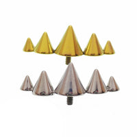 Body Clickers titanium cone spike curve implant earrings, flatback labret, internally threaded in 14g, 16g, and 18g sizes.