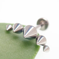 Titanium cone spike curve implant labret earrings with flatback, internally threaded in 14g, 16g, and 18g sizes.