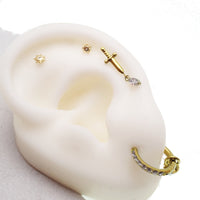Titanium Dagger Flatback Piercing Earrings in 14g, 16g, and 18g by Body Clickers, featuring sleek dagger design and flatback style.