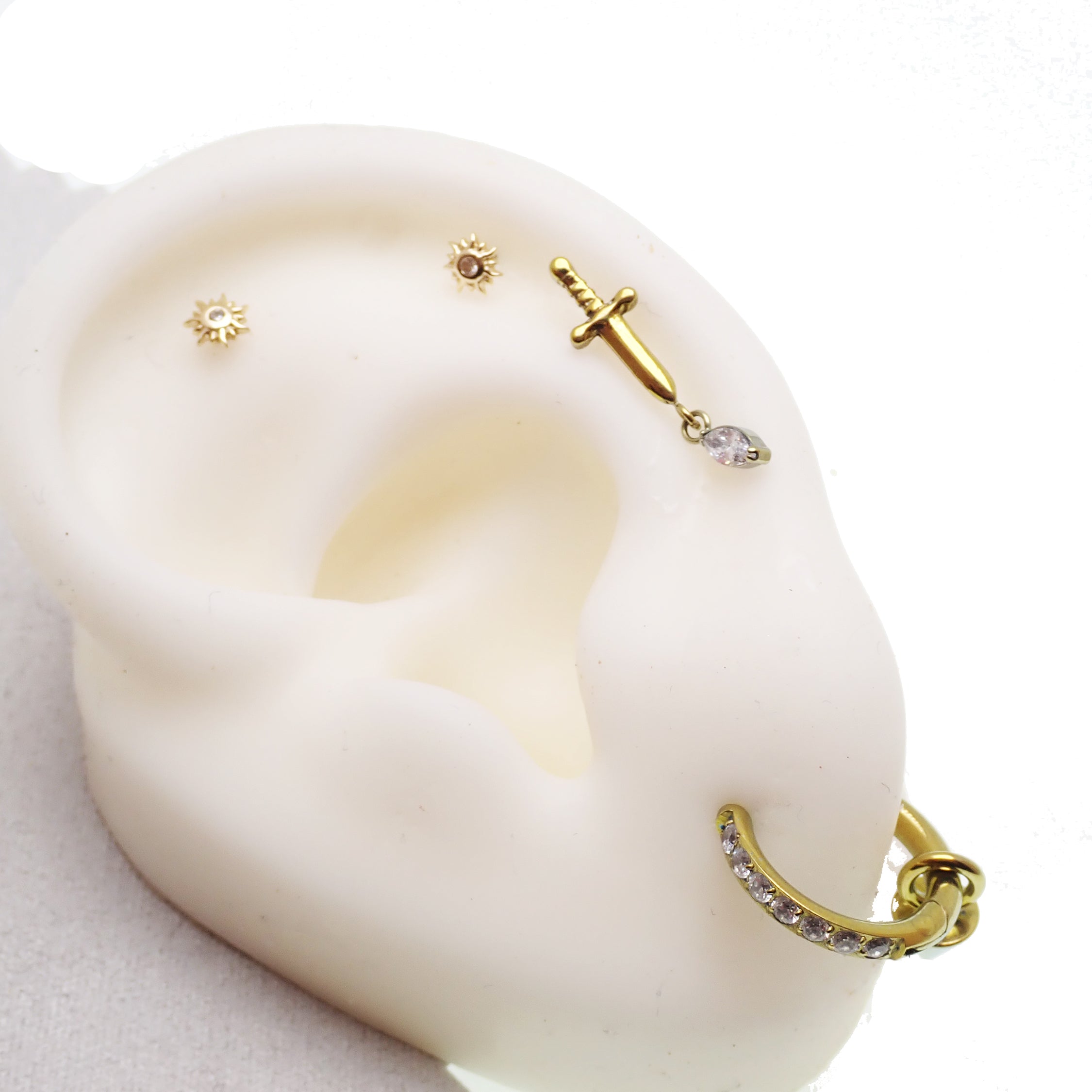 Titanium Dagger Flatback Piercing Earrings in 14g, 16g, and 18g by Body Clickers, featuring sleek dagger design and flatback style.