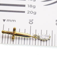 Titanium Dagger Flatback Piercing Earring in 14g, 16g, 18g by Body Clickers, featuring a sleek dagger design on a flatback style.