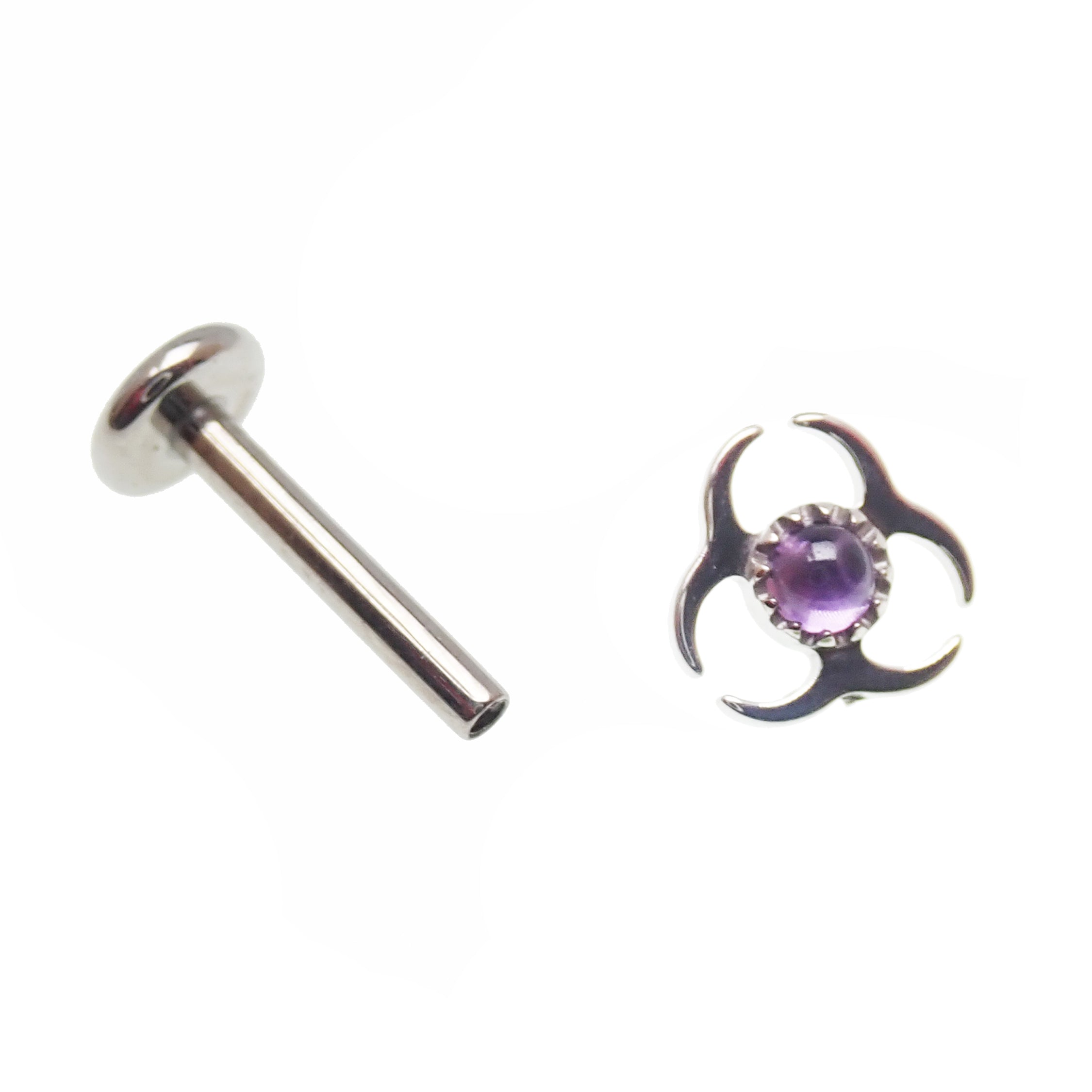 Titanium labret piercing earrings with amethyst biohazard symbol, flatback design, available in 14g, 16g, and 18g sizes.