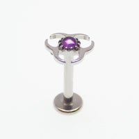 Titanium amethyst biohazard symbol flatback labret piercing earrings in 14g, 16g, and 18g from Body Clickers