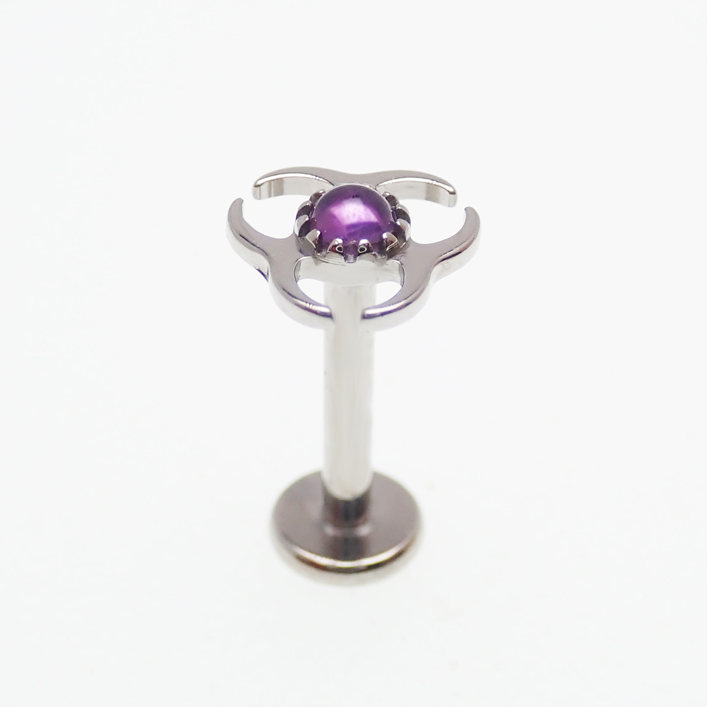 Titanium amethyst biohazard symbol flatback labret piercing earrings in 14g, 16g, and 18g from Body Clickers