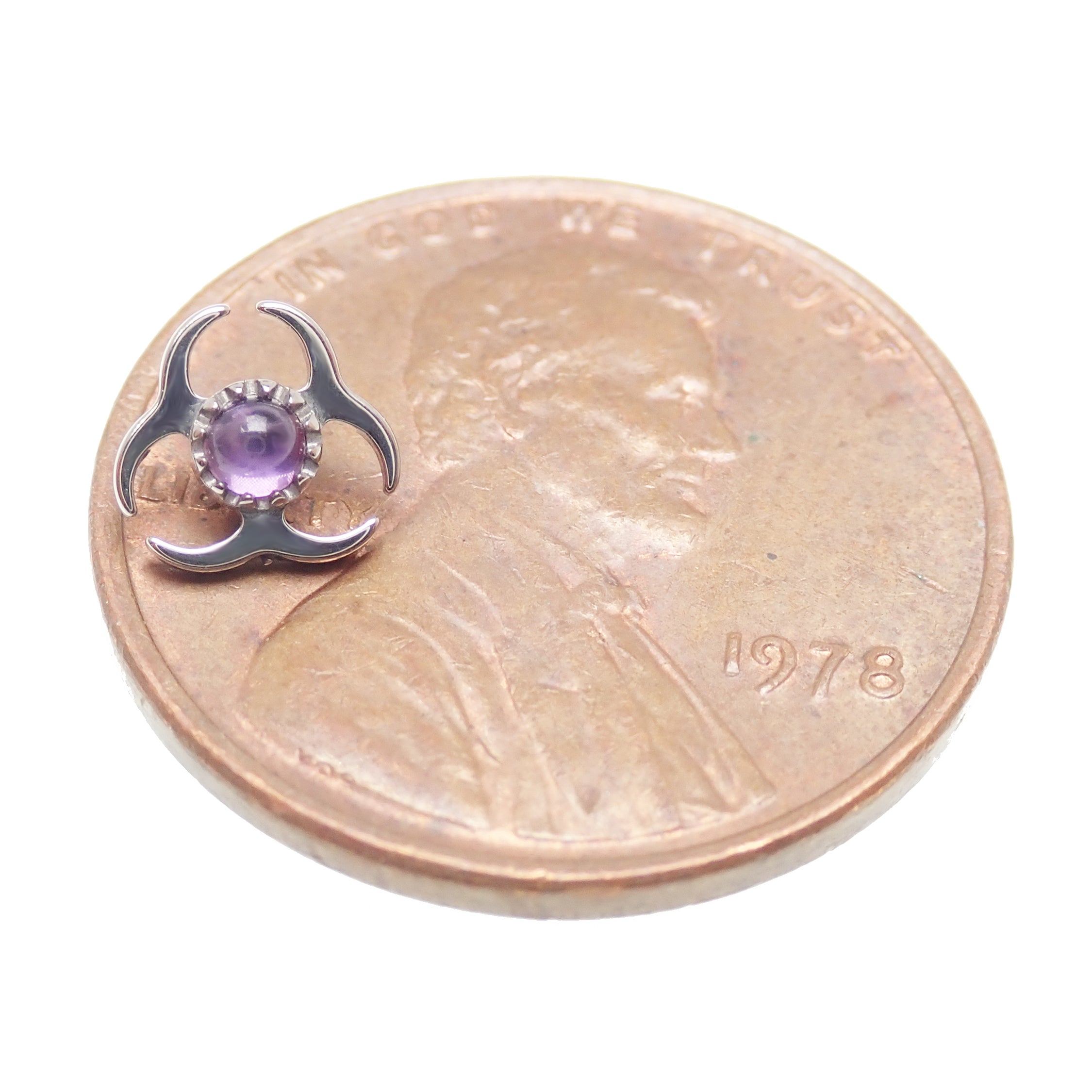 Titanium labret piercing with amethyst biohazard symbol, flatback design in 14g, 16g, and 18g sizes by Body Clickers.
