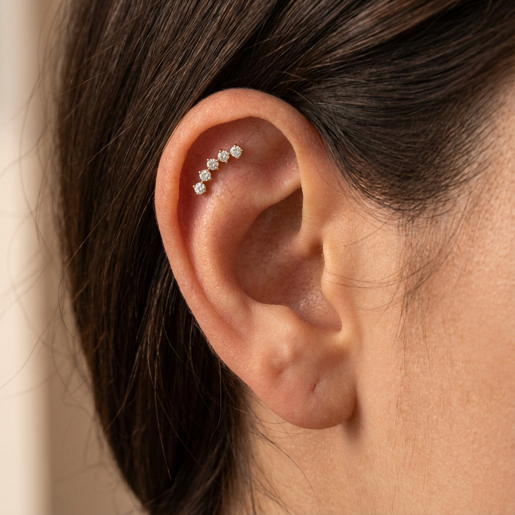 Body Clickers implant titanium curved labret earrings with cubic zirconia flatback in 14g, 16g, and 18g sizes.