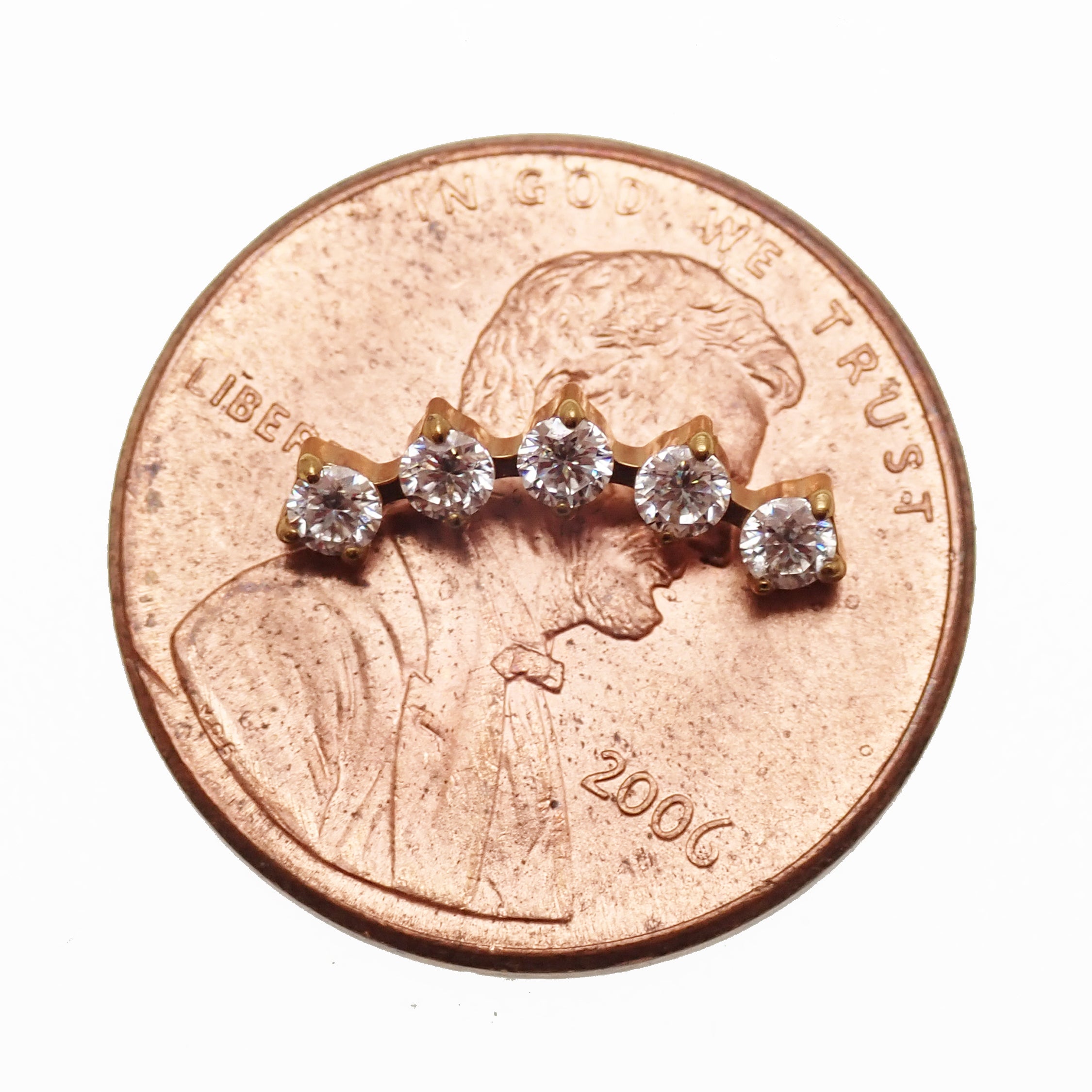 Body Clickers implant titanium curved labret earrings with cubic zirconia flatback, available in 14g, 16g, and 18g sizes.