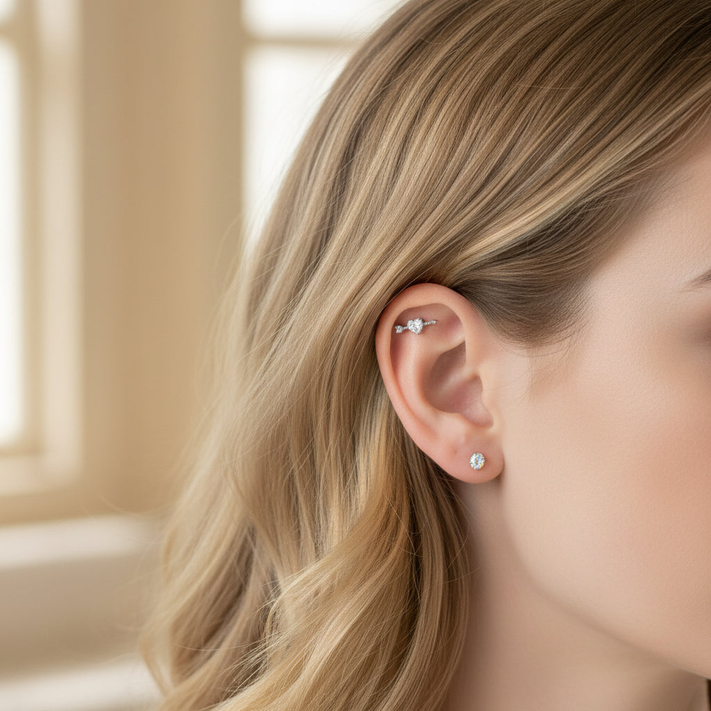 Titanium CZ arrow through a heart flatback labret piercing earring by Body Clickers, 18g, 6mm, for ear jewelry.