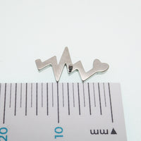 Titanium heartbeat flatback internally threaded labret piercing earrings in 14g, 16g, and 18g by Body Clickers
