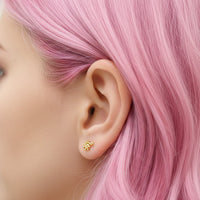 Body Clickers implant titanium PVD beaded swirl flatback labret earrings in 14g, 16g, and 18g with beaded swirl design.