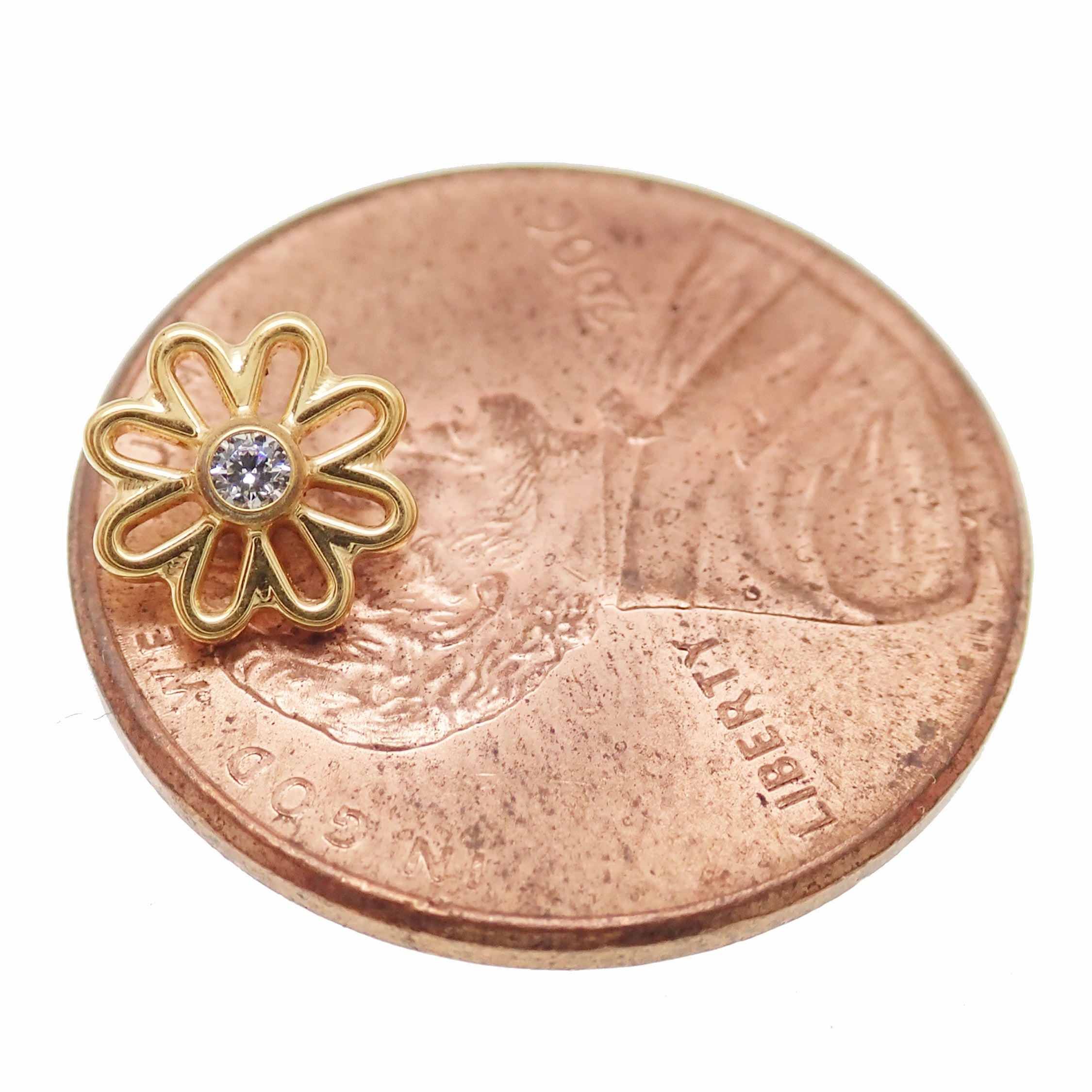 Gold flower implant titanium labret piercing with CZ stone, available in 14g, 16g, and 18g sizes, body jewelry by Body Clickers.