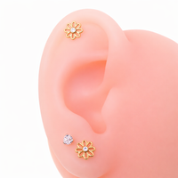Titanium PVD gold flower labret piercing earrings with CZ stone, available in 14g, 16g, and 18g sizes, Body Clickers.