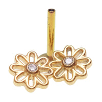 Gold flower implant titanium labret piercing with CZ stone, available in 14g, 16g, and 18g, Body Clickers earrings.