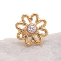 Gold flower implant titanium labret piercing with CZ stone, available in 14g, 16g, and 18g, Body Clickers earrings.