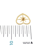 Gold titanium heart and starburst flatback piercing earrings by Body Clickers, internally threaded for 14g, 16g, and 18g.
