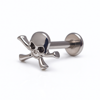 Titanium skull and crossbones flatback piercing earrings by Body Clickers, internally threaded, available in 14g, 16g, and 18g.