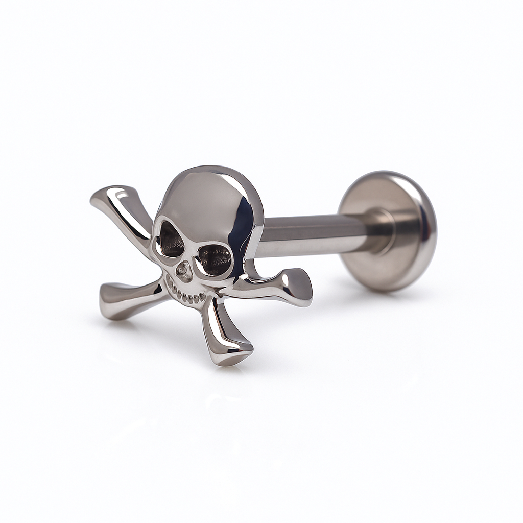 Titanium skull and crossbones flatback piercing earrings by Body Clickers, internally threaded, available in 14g, 16g, and 18g.