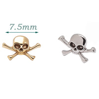 Titanium skull and crossbones flatback piercing earrings by Body Clickers, internally threaded in 14g, 16g, and 18g sizes.