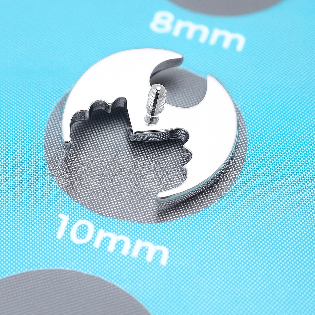 Titanium winged heart implant earrings, 18g, 16g, 14g, with flatback design, internally threaded for body piercing.