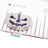 Pumpkin-shaped Titanium flatback piercing earrings in 14g, 16g, and 18g from Body Clickers, suitable for body jewelry.