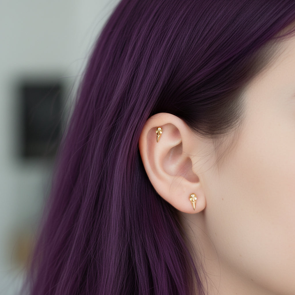 Titanium Raven Skull Flatback Piercing earrings in 18g, 16g, 14g with internally threaded design by Body Clickers