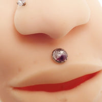 Stained glass amethyst implant titanium earrings by Body Clickers, 18g internally threaded ear piercing with 6mm decorative glass stone.