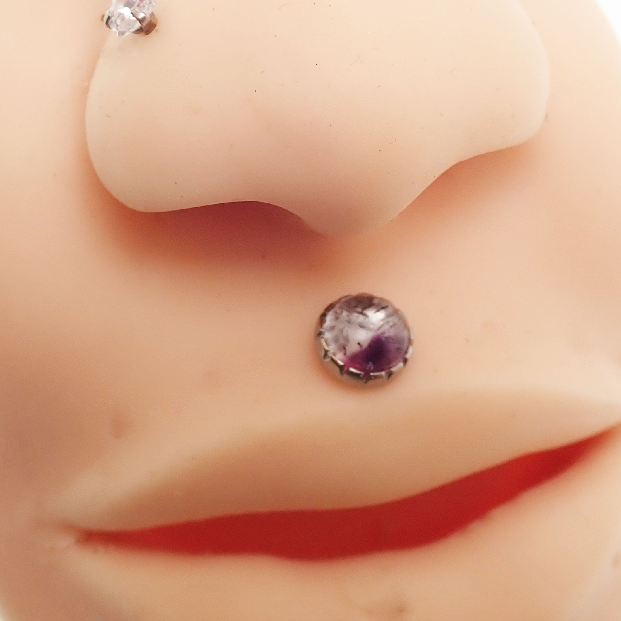 Stained glass amethyst implant titanium earrings by Body Clickers, 18g internally threaded ear piercing with 6mm decorative glass stone.
