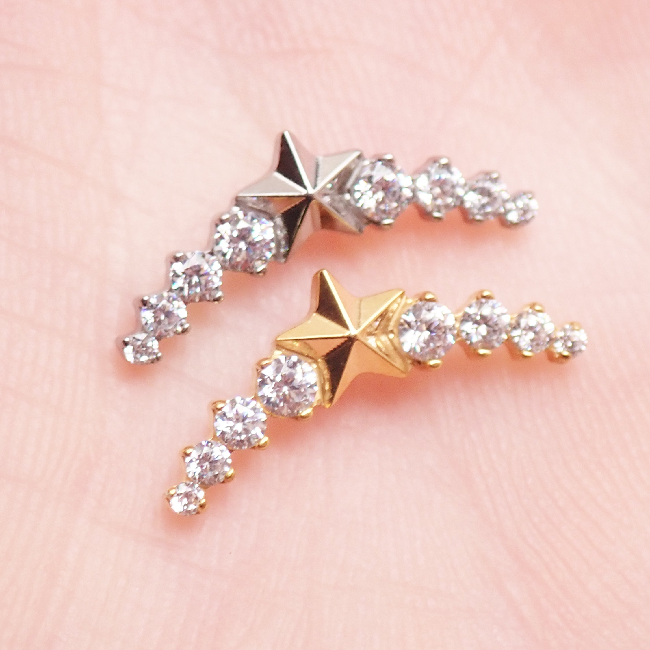 Star CZ helix curve titanium earrings in 14g, 16g, and 18g with flatback labret piercing, featuring sparkling star design.