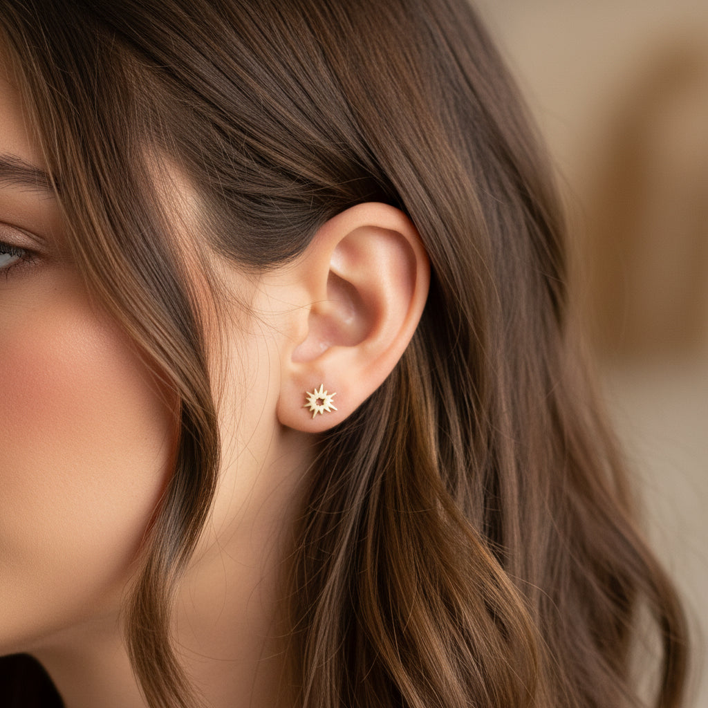 Starburst titanium flatback labret piercing earrings in 14g, 16g, and 18g with internally threaded design.